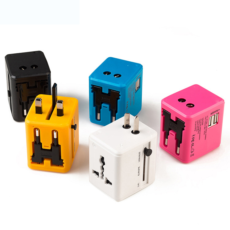 Adaptor ổ cắm chuyển đổi đa năng. In logo theo yêu cầu. Có 5 chấu cắm phổ biến—phích cắm EU, Anh, Mỹ và Úc, sử dụng ở bất cứ nơi nào bạn đi du lịch