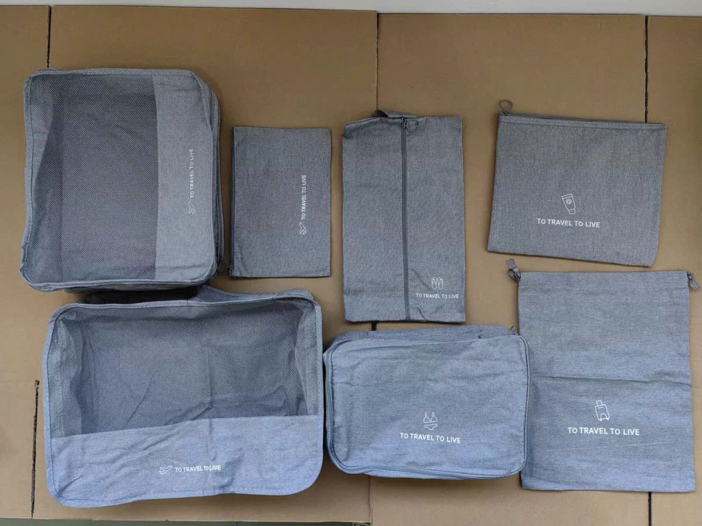 Set túi du lịch in logo vải tốt