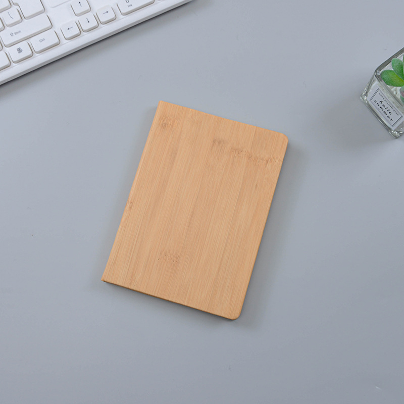 Sổ bìa tre đóng gáy chỉ là quà tặng in logo theo yêu cầu độc đáo, thân thiện môi trường, phù hợp tặng đối tác, khách hàng, nhân viên yêu thiên nhiên.